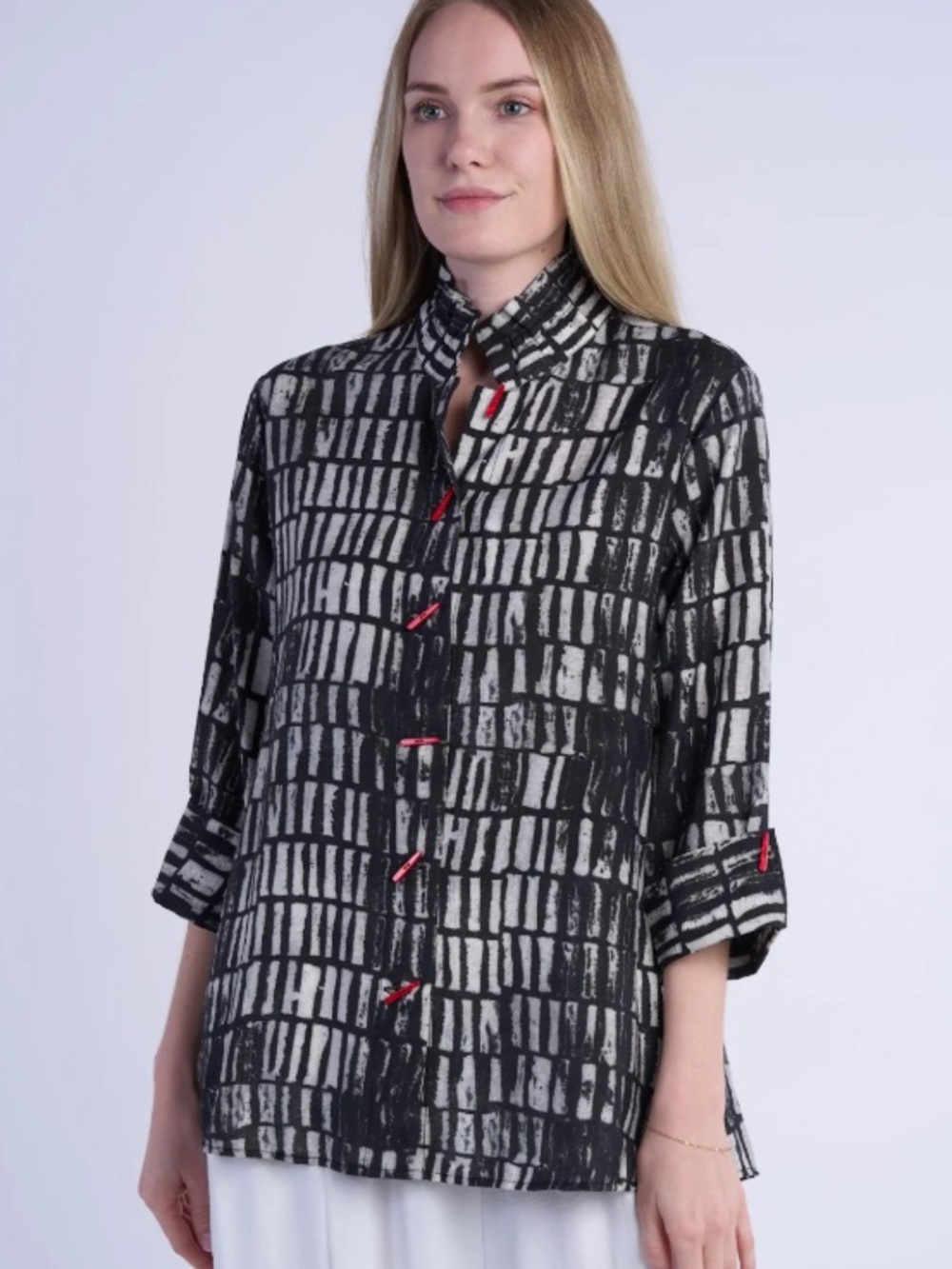 Black & White Grid-Print Button-Front Blouse with Red Button Accents